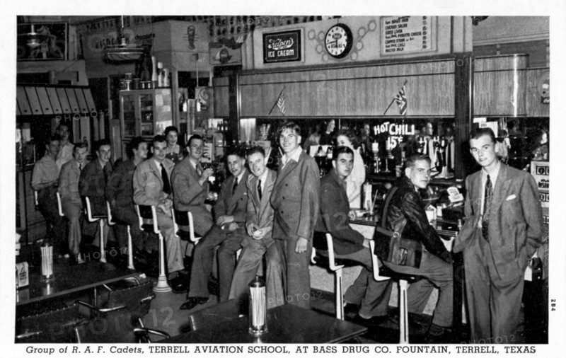 Group of RAF cadets at Bass Drug Co Fountain, Terrell, Texas, USA, 1942. Artist: Unknown