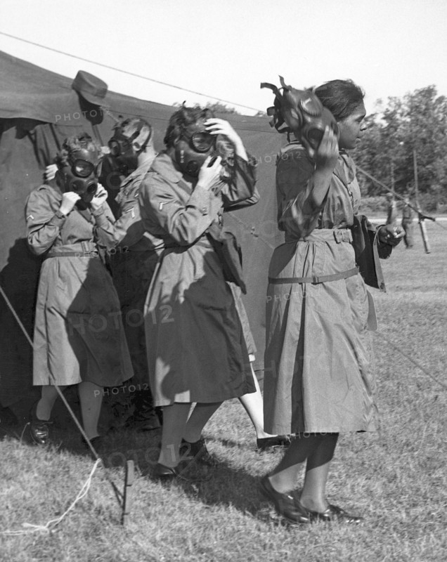 WACS emerging after gas chamber training, Fort Sheridan, Illinois, USA, 1964. Artist: SP5 Wigley