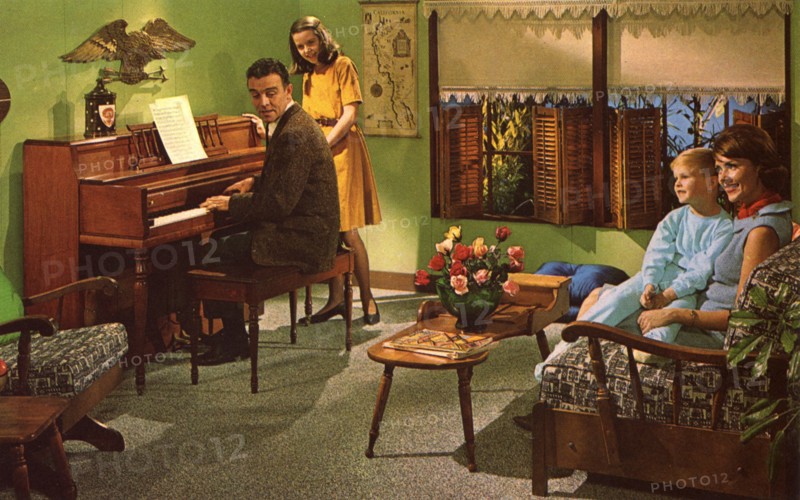 Family with a Wurlitzer model 2620 piano, USA, 1964. Artist: Unknown