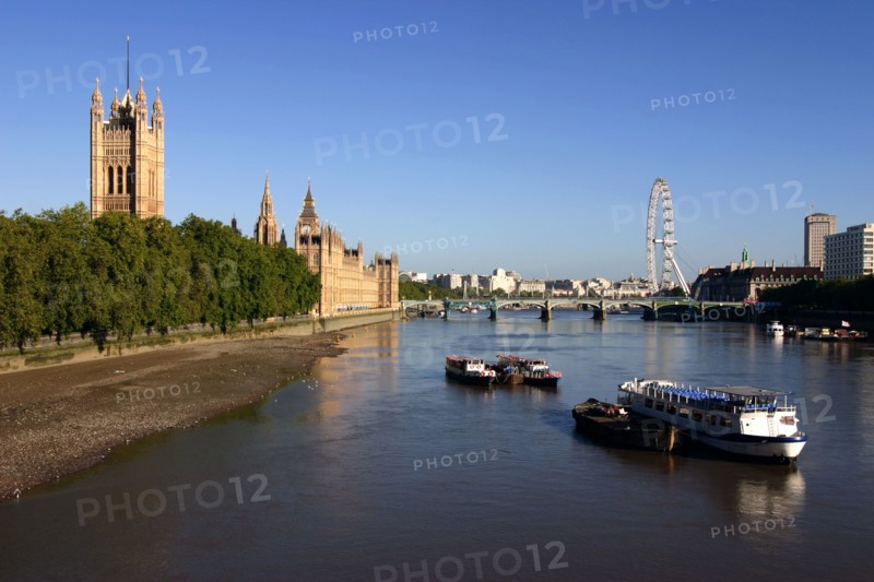 River Thames, Houses of Parliament and The London Eye, London.