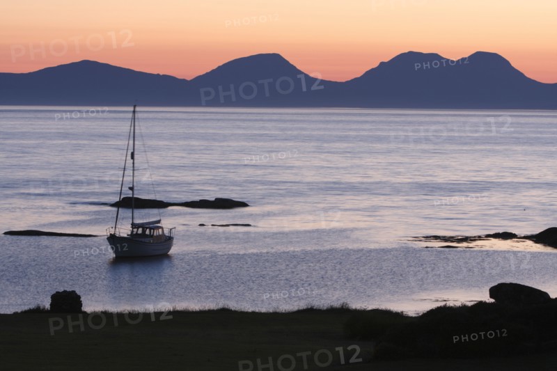 Sunset over Jura seen from Kintyre, Argyll and Bute, Scotland.
