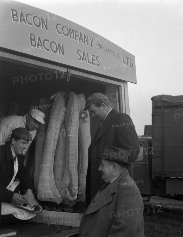 Buying wholesale meat from a Danish Bacon Company lorry, Barnsley, South Yorkshire, 1961. Artist: Michael Walters