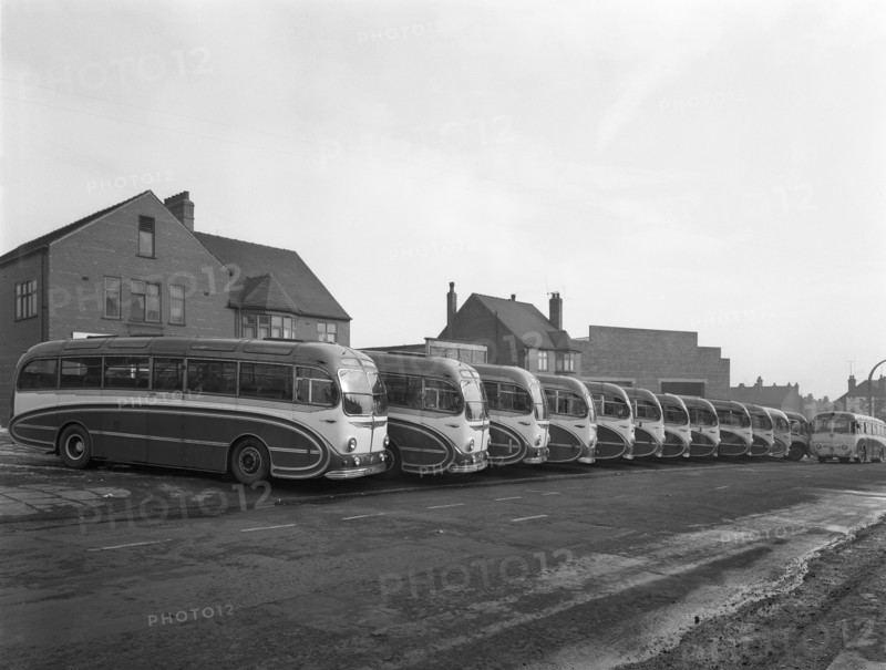 Fleet of Phillipson's coaches, Goldthorpe, South Yorkshire, 1963.  Artist: Michael Walters