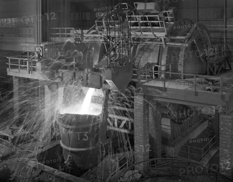 Pouring molten iron, Park Gate steelworks, Rotherham, South Yorkshire, 1964. Artist: Michael Walters