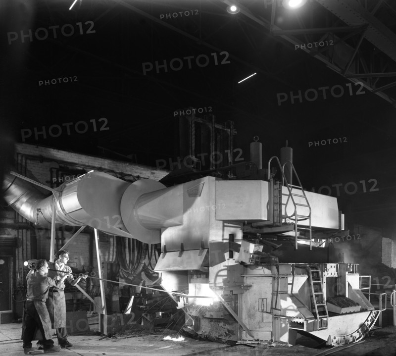 Checking the temperature of molten steel, Sheffield, South Yorkshire, 1964. Artist: Michael Walters