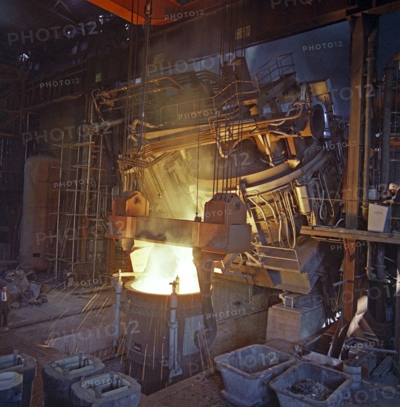 75 ton arc furnace pouring molten steel into a vessel, Sheffield, South Yorkshire, 1969. Artist: Michael Walters