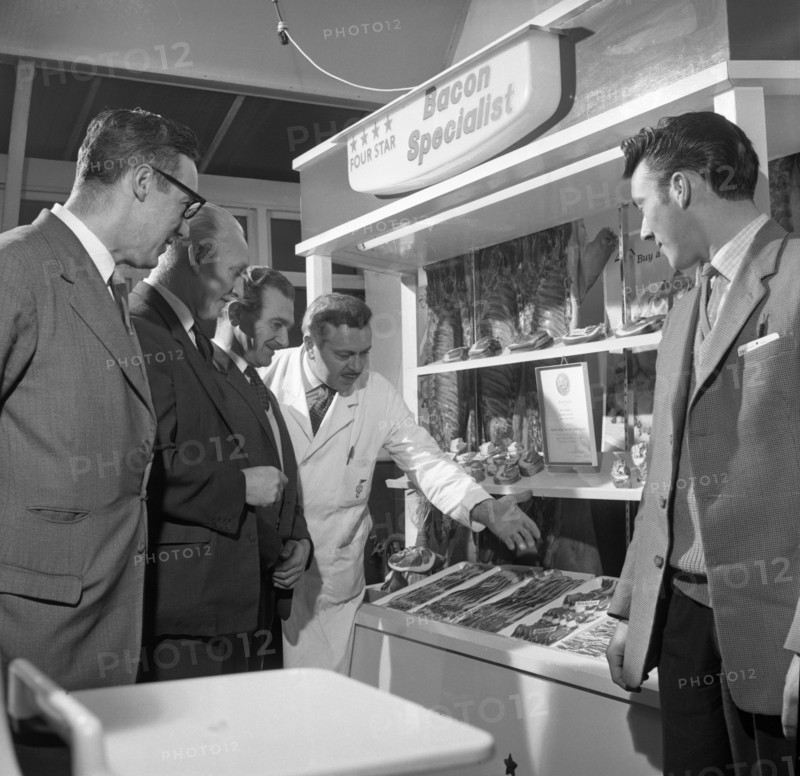Butcher from Danish Bacon giving a demonstration, Kilnhurst, South Yorkshire, 1961.  Artist: Michael Walters