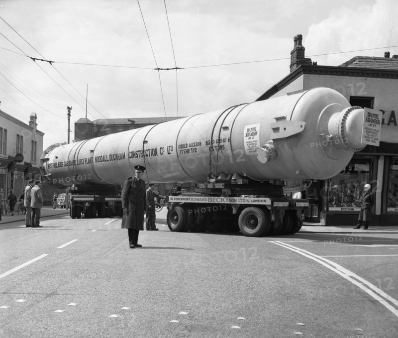 A heavy load stops the Manchester traffic, 1962.  Artist: Michael Walters