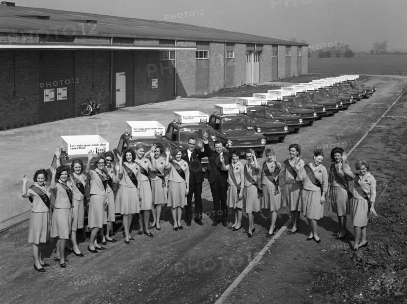 Australian sales girls in front of a fleet of 1965 Hillman Imps, Selby, North Yorkshire, 1965. Artist: Michael Walters