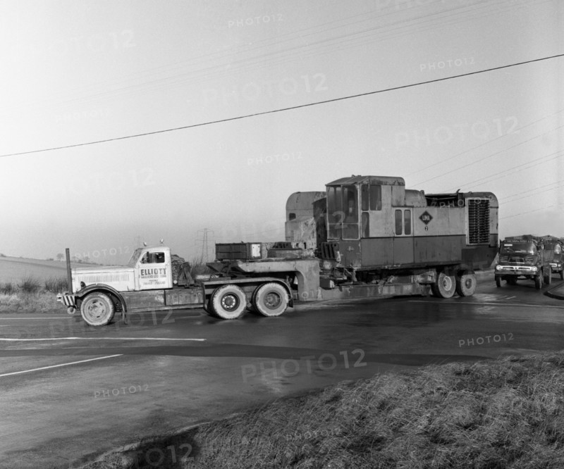 Early 1940s Diamond T truck pulling a large load, South Yorkshire, 1962. Artist: Michael Walters
