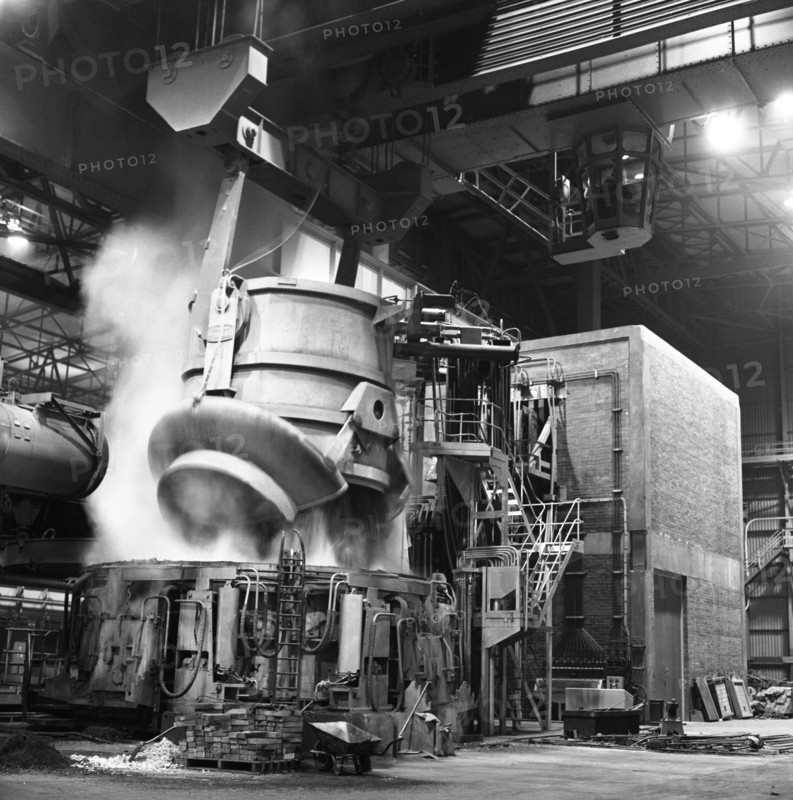 Charging a furnace, Park Gate Iron & Steel Co, Rotherham, South Yorkshire, 1964.  Artist: Michael Walters