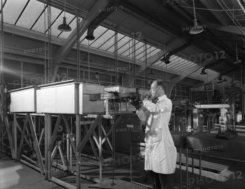 Tungsten carbide furnace being loaded, Edgar Allen Steel Co, Sheffield, South Yorkshire, 1962. Artist: Michael Walters