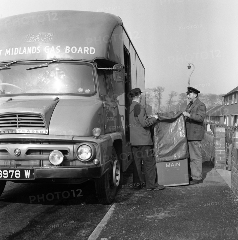 Home delivery of a cooker, Darfield, Barnsley, South Yorkshire, 1963. Artist: Michael Walters