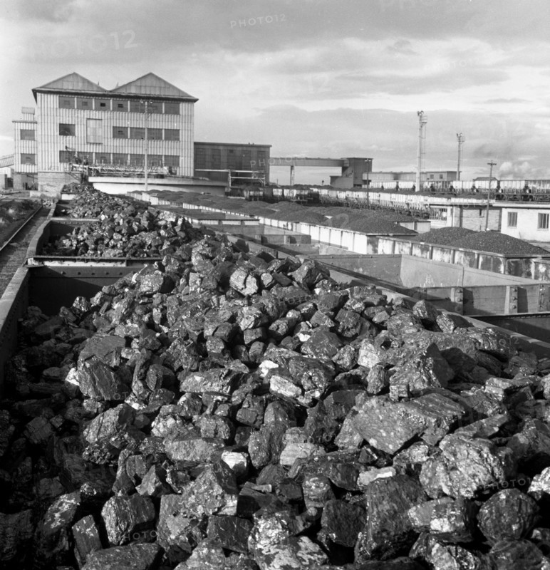 Rail trucks loaded with coal leaving Lynemouth Colliery, Northumberland, 1963.  Artist: Michael Walters