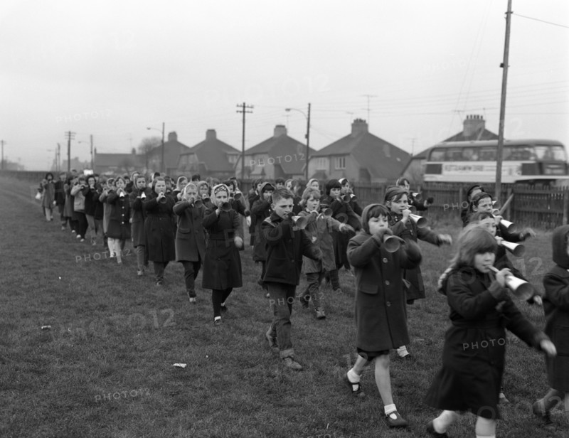 Children marching with home made bugles, Middlesborough, Teesside,1964.  Artist: Michael Walters