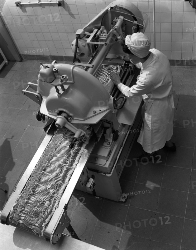 Bacon slicing machine, Danish Bacon Company, Selby, North Yorkshire, 1964. Artist: Michael Walters
