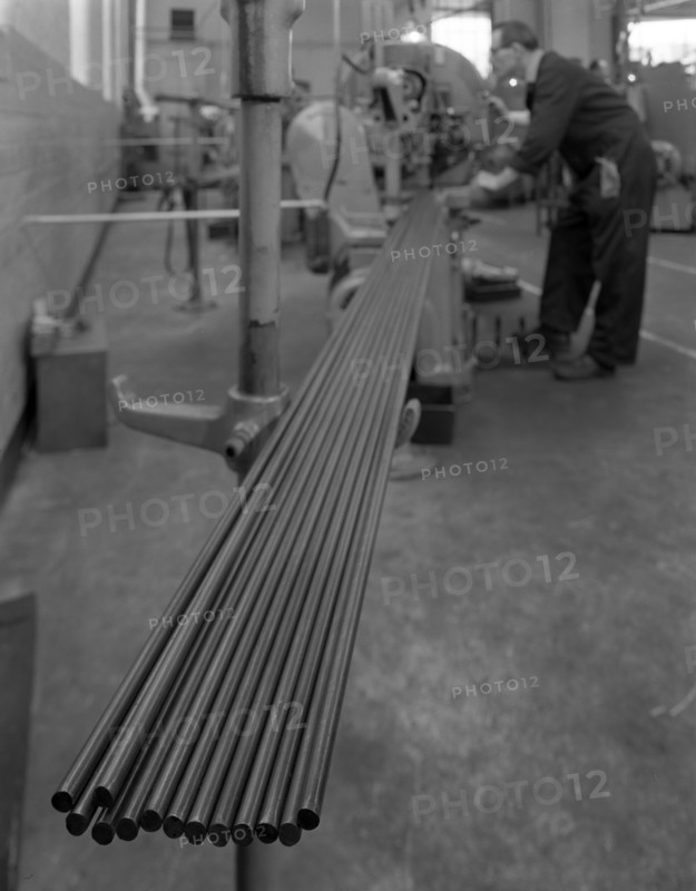 Cutting steel rods to length, Park Gate Iron & Steel Co, Rotherham, South Yorkshire, 1964. Artist: Michael Walters