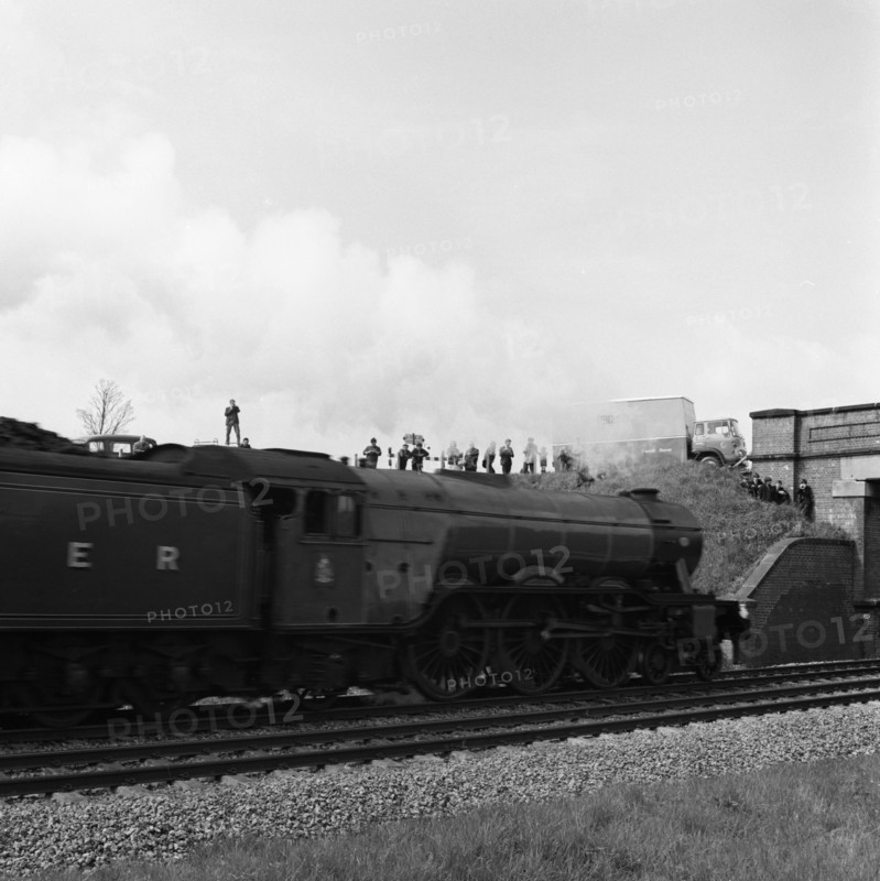 The 'Flying Scotsman' passing under a bridge at speed, near Selby, North Yorkshire, 1968. Artist: Michael Walters