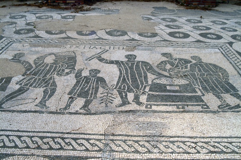 A black and white floor mosaic of grain measurers, Ostia Antica, Italy. Artist: Samuel Magal