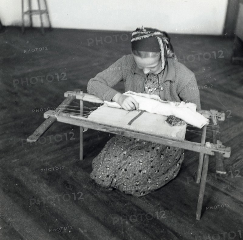 Woman weaving, Sarajevo, Bosnia-Hercegovina, Yugoslavia, 1939. Artist: Unknown