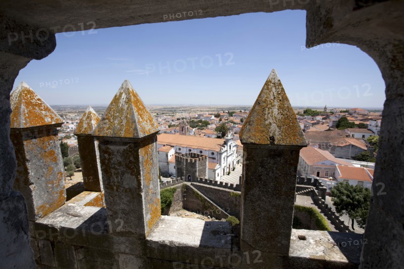 Merlons on the battlements of Beja Castle and view of the city, Beja, Portugal, 2009. Artist: Samuel Magal