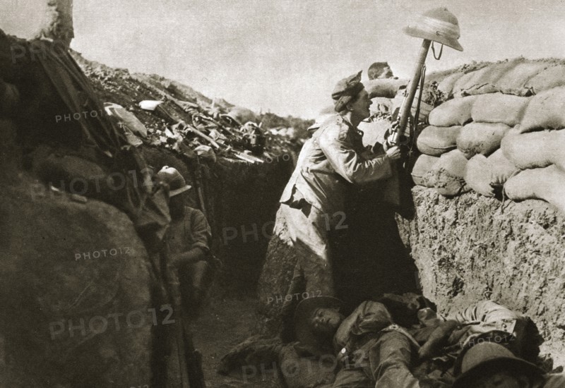A Royal Irish Fusilier teases a Turkish sniper, Gallipoli, Turkey, World War I, c1915-c1916. Artist: Unknown