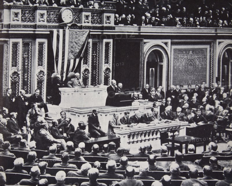 President Wilson in Congress recommending the US enter the war against Germany, 1917. Artist: Unknown