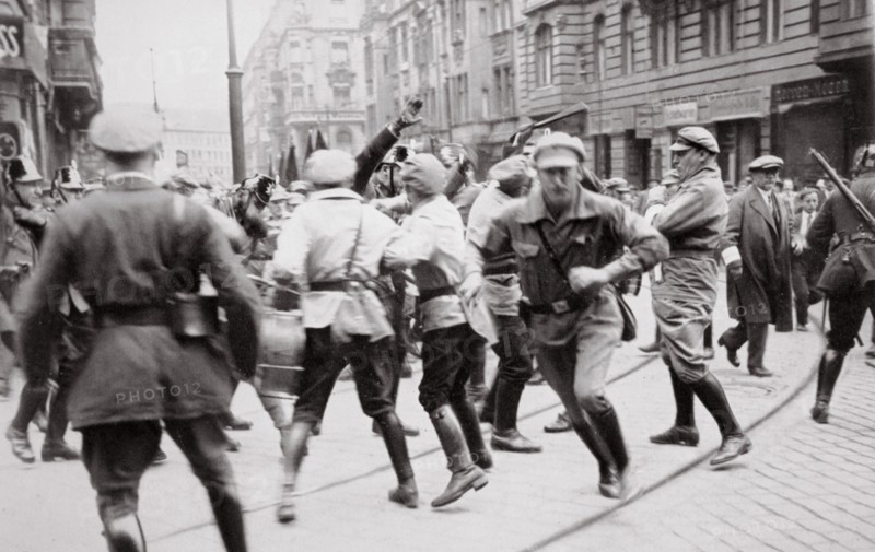 Men in Bolshevik uniform fighting police in the street, Germany, c1918-c1933(?) (1936). Artist: Unknown