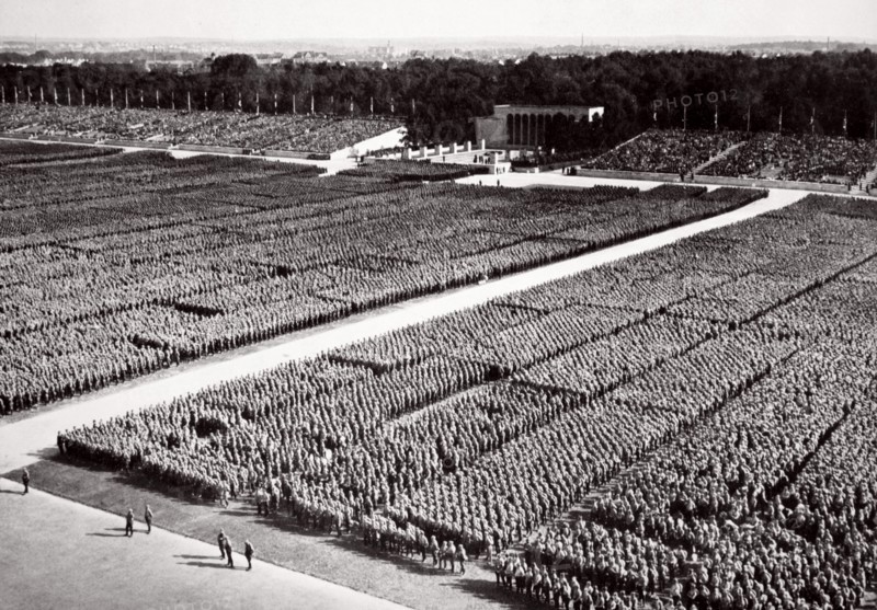 Stormtroopers lined up on parade during a Nazi Party Congress in Nuremberg, Germany, 1936. Artist: Unknown