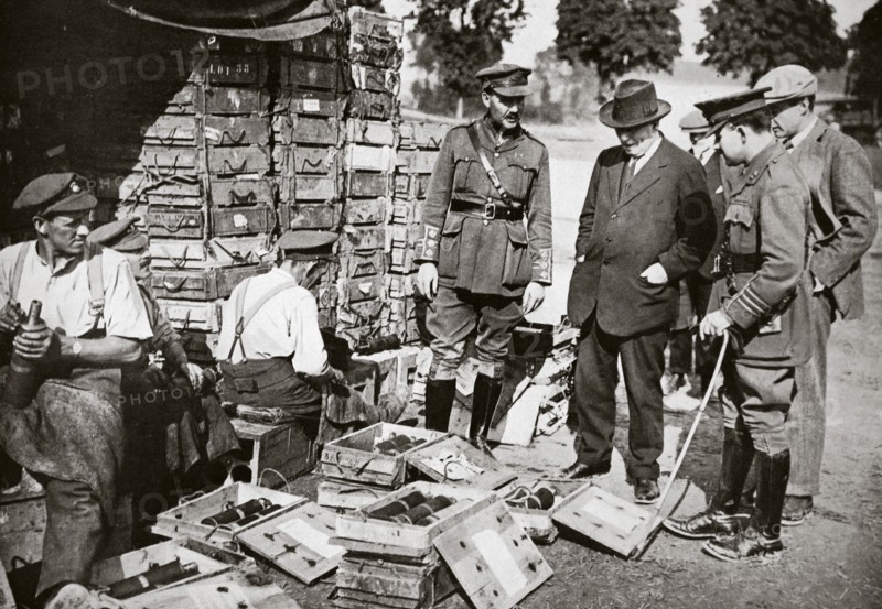 Mr Asquith watching men adjusting fuses, Somme campaign, France, World War I, 1916. Artist: Unknown