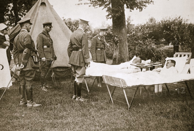 King George V conversing with wounded officers, France, World War I, 1916. Artist: Unknown
