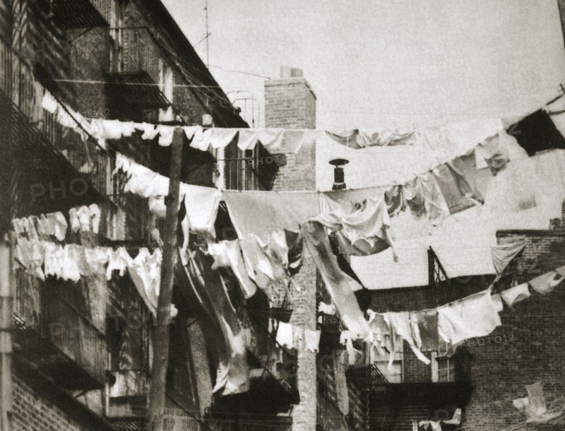 Wash day at some New York tenement buildings, USA, early 1930s. Artist: Unknown