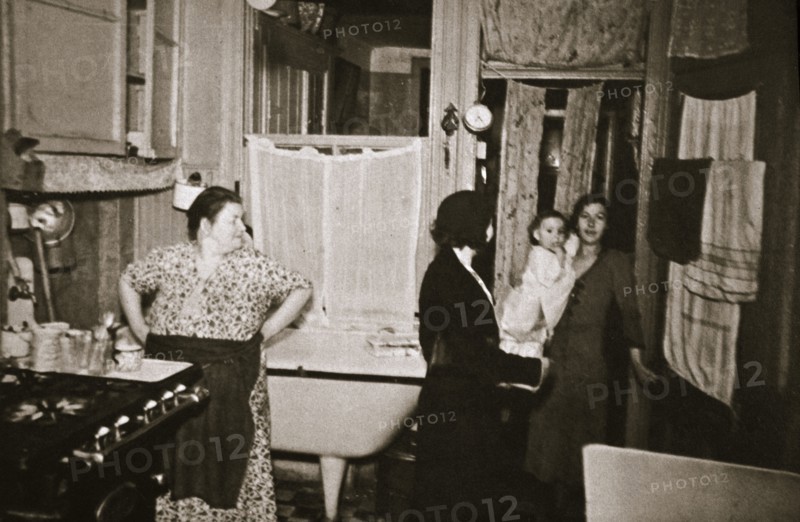 Residents of a tenement, Henry Street, Lower East Side, Manhattan, New York, USA, early 1930s. Artist: Unknown