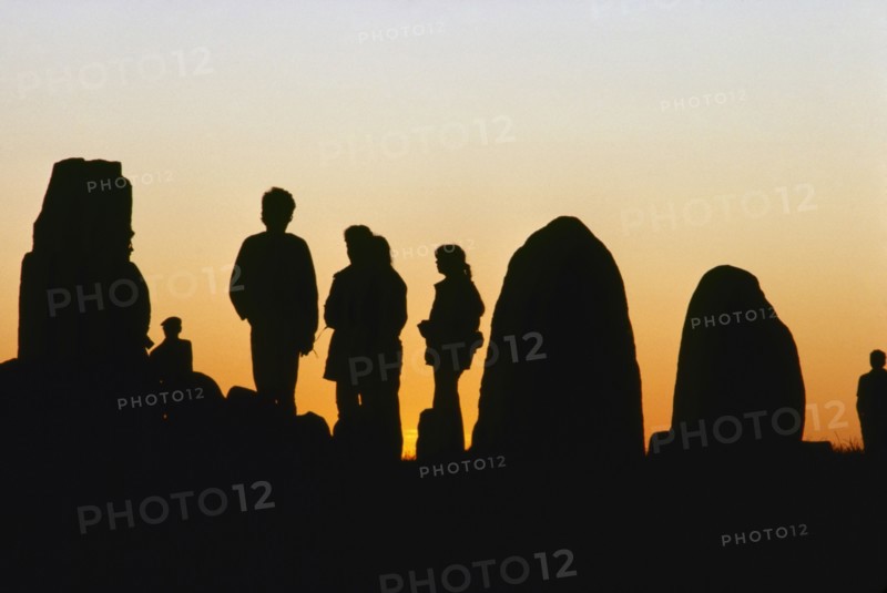 People by Ale's Stones, Kåseberga, Scania, Sweden. Artist: Stefan Hallberg