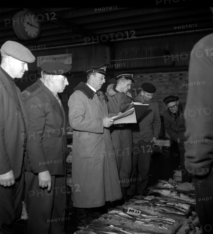 Wholesalers and fishmongers at the fish auction, Gothenburg, Sweden, 1960. Artist: Torkel Lindeberg