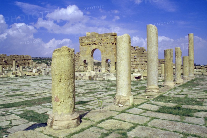 Antonine Gate and ruined pillars, Sbeitla, Tunisia.