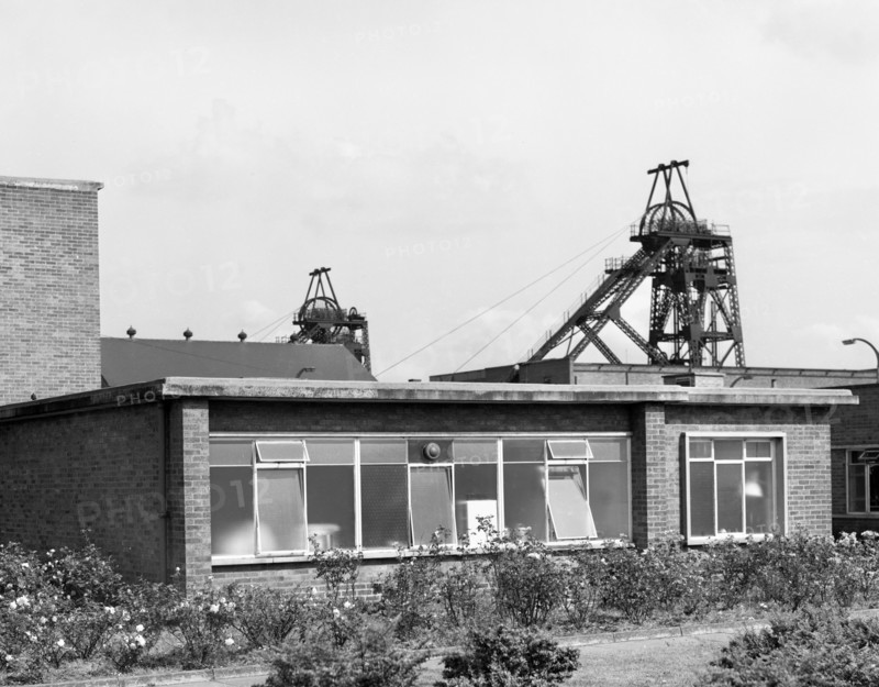 The pit head and offices at Ollerton Colliery, North Nottinghanshire, 11 July 1962. Artist: Michael Walters