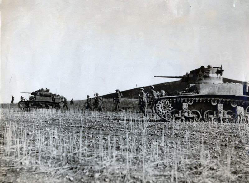 British troops supported by American tanks advance on the Tunisian front, December 1942. Artist: Unknown