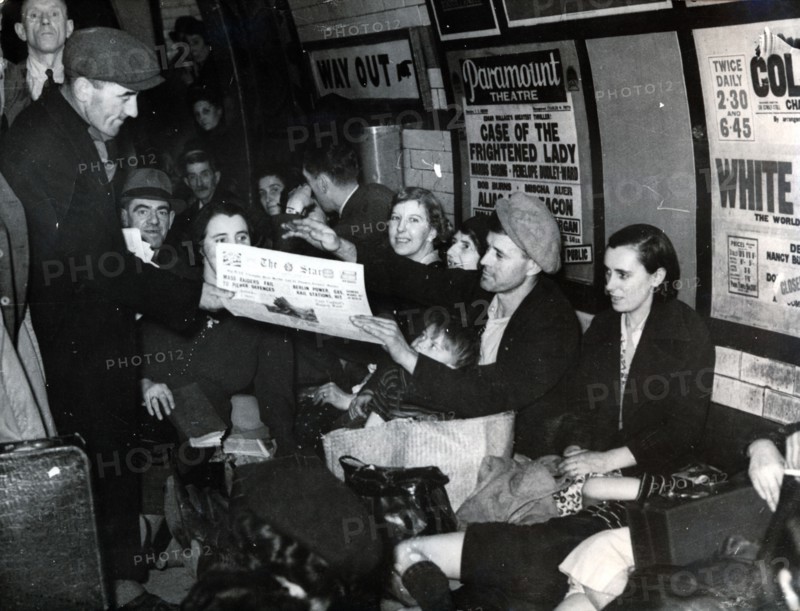 Paper seller down in the underground, London, c.1940. Artist: Unknown