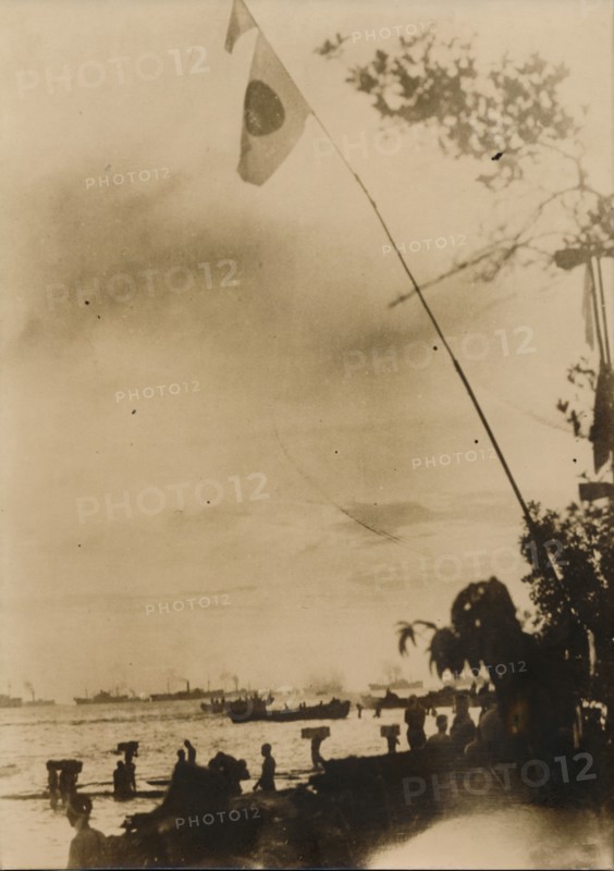 A Japanese convoy disembark troops on a Pacific island, c.1943. Artist: Unknown