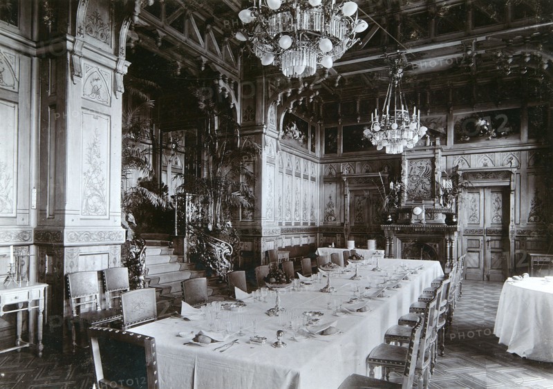 Dining room of the Imperial Palace in Bialowieza Forest, Russia, late 19th century.  Artist: Mechkovsky