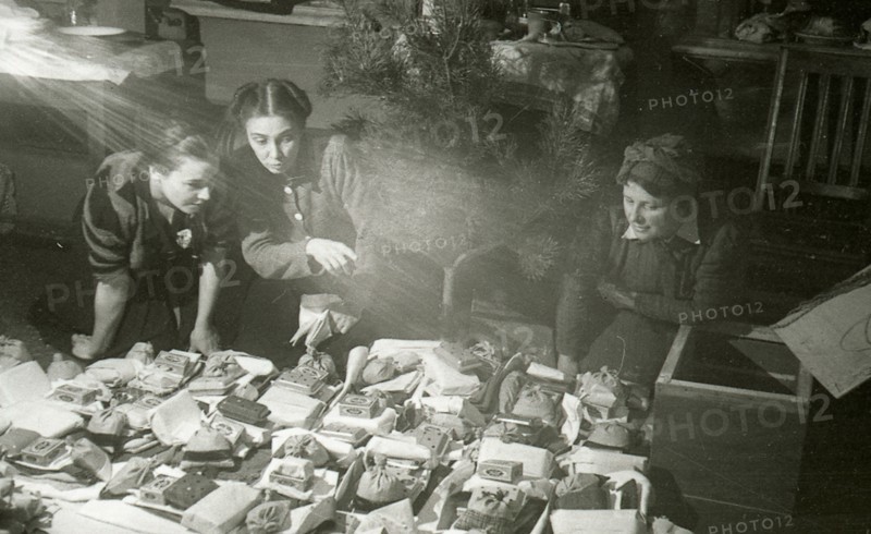 Actresses of the Moscow Art Theatre preparing presents for the Red Army, USSR, 1943. Artist: Anon