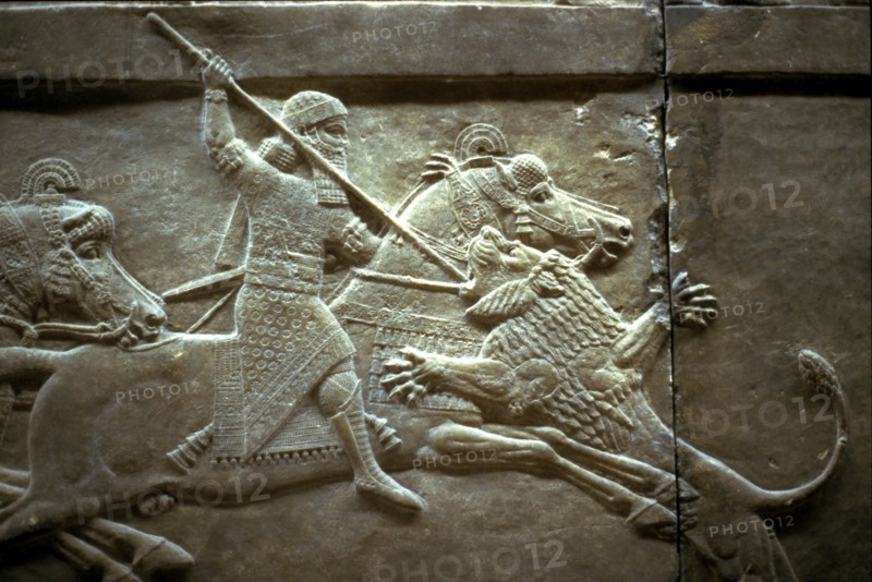 King Ashurnasirpal II during a royal lion hunt, 650-620 BC. Artist: Assyrian Art