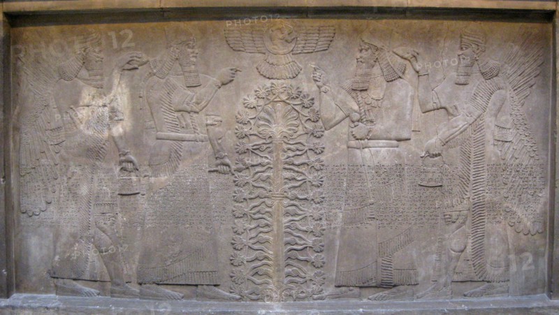 Relief with two figures of Ashurnasirpal, winged mythological beings and the god Ashur, before the Tree of Life, 885-860 BC. Artist: Assyrian Art