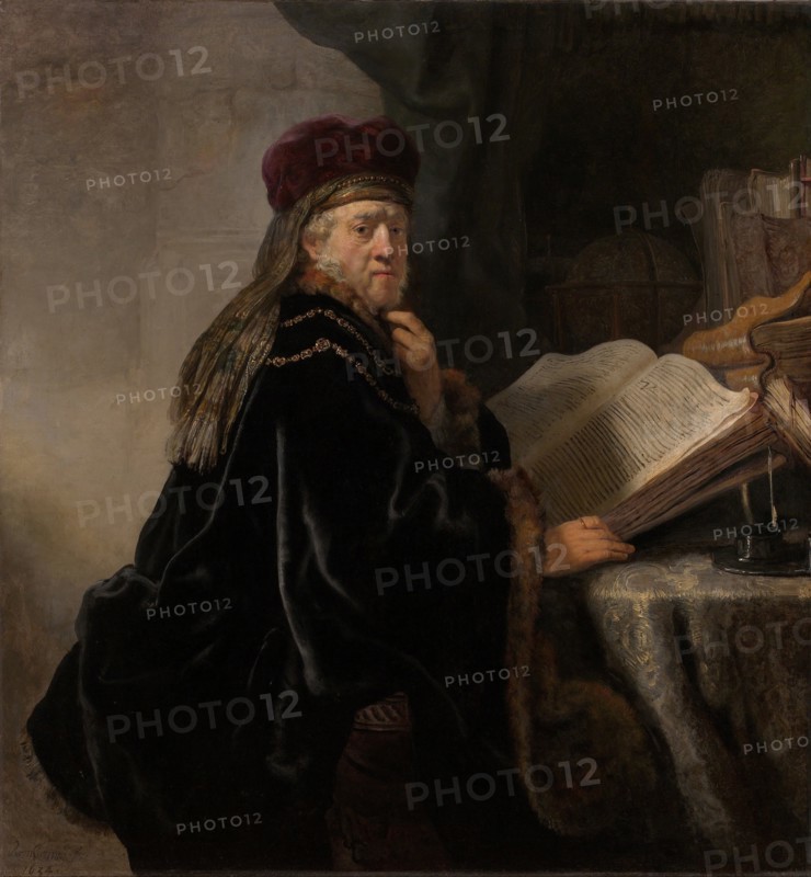 A Scholar Seated at a Desk (Scholar at his Study). Artist: Rembrandt van Rhijn (1606-1669)