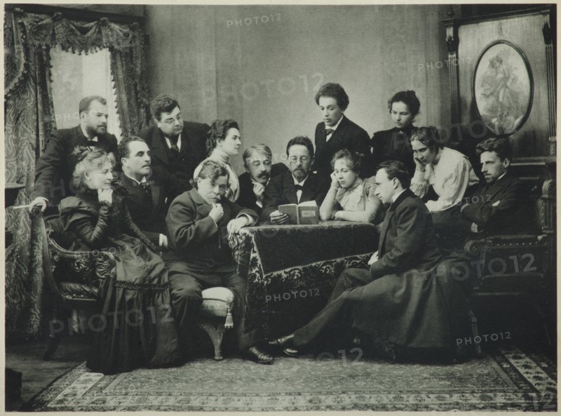 Anton Chekhov reads The Seagull with the Moscow Art Theatre company, 1899. Artist: Pavlov, Pyotr Petrovich (1860-1925)