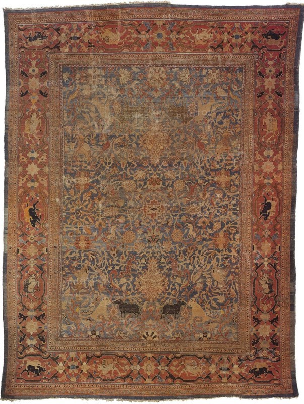 Amida carpet depicting the emblem of Emir: lion attacking bull.