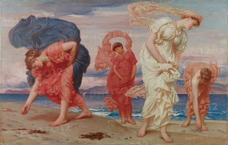 Greek girls picking up pebbles by the sea.