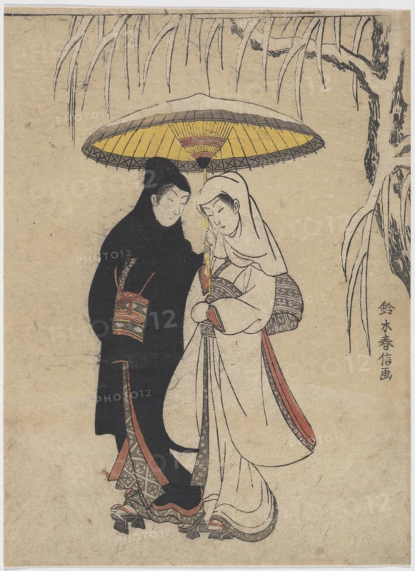Young Lovers Walking Together under an Umbrella in a Snow Storm.
