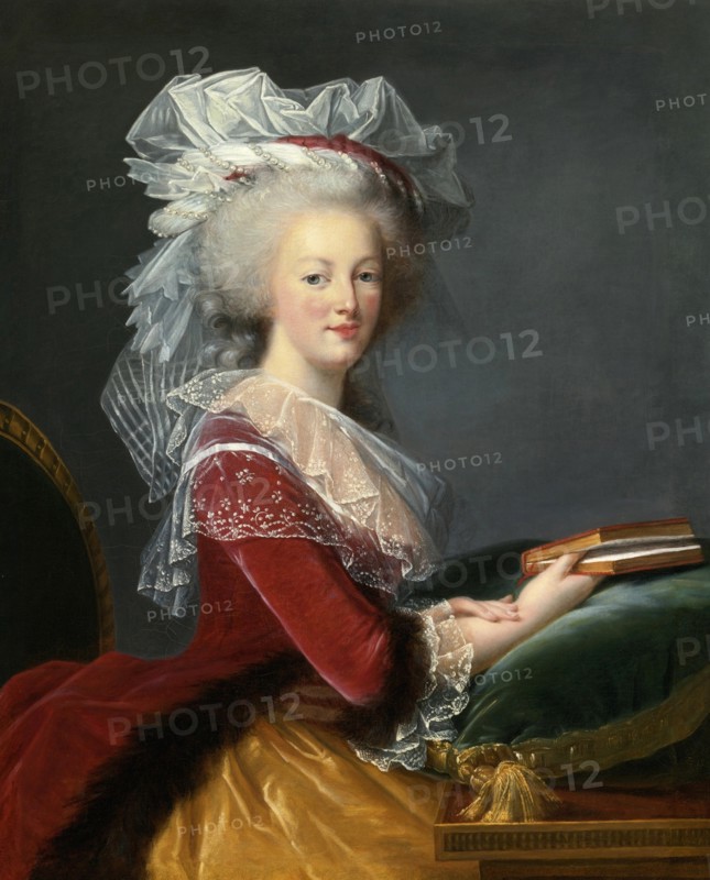Marie Antoinette with a book.